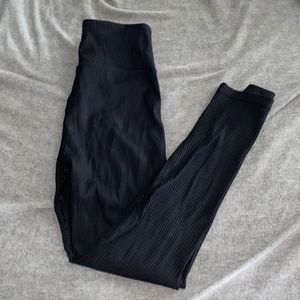 Ribbed black leggings with crossover at waist